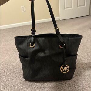 Michael Kors Black Tote with Gold Accents